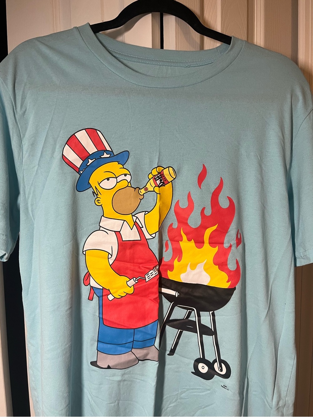 The Simpsons 4th of July Homer Simpson men’s t-shirt size Large, light blue